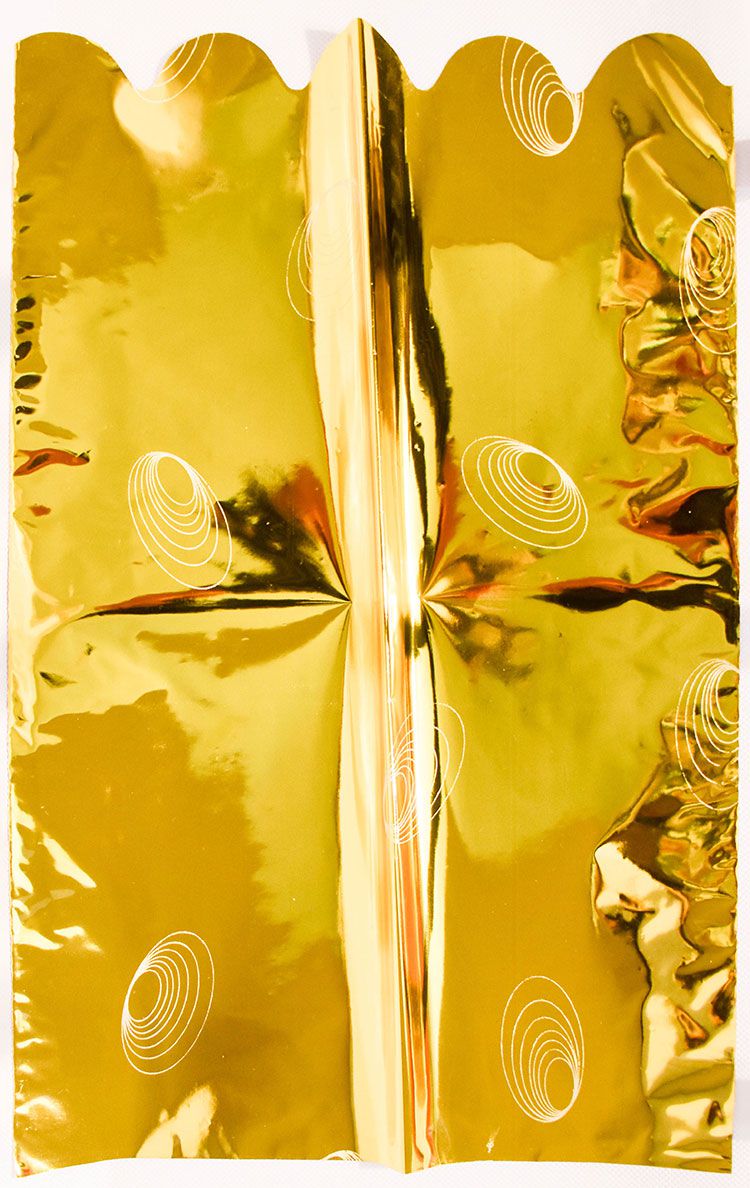 Aranyszínű ajándékzacskó, kör mintákkal
